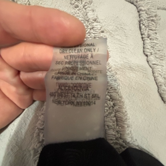 Slinky and shimmery black midi dress by Alice+Olivia. - Picture 3 of 5